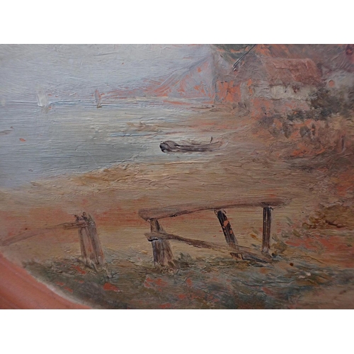 325 - A WATCOMBE POTTERY, TORQUAY PAINTED PLAQUE oval with coastal scene 22.5cm wide (some loss to paint)