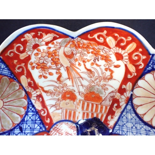 357 - A JAPANESE IMARI DISH WITH LOBED RIM and typical decoration 30.5cm dia (wear to gilt)