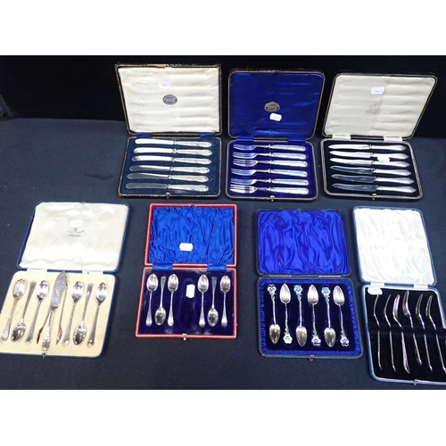 407 - BOXED SETS OF SILVER TEASPOONS AND SILVER HANDLED DESSERT SETS including a set with enamelled pansy ... 