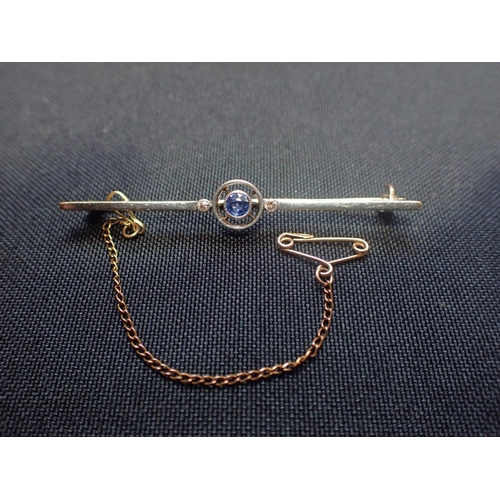 417 - AN UNMARKED YELLOW METAL BAR BROOCH and a 'Gianni Style' brooch (2)