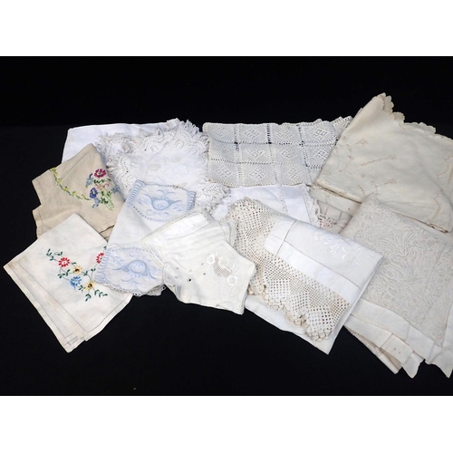 43 - A COLLECTION OF IRISH LINEN mostly tablecloths and napkins, many lace trimmed