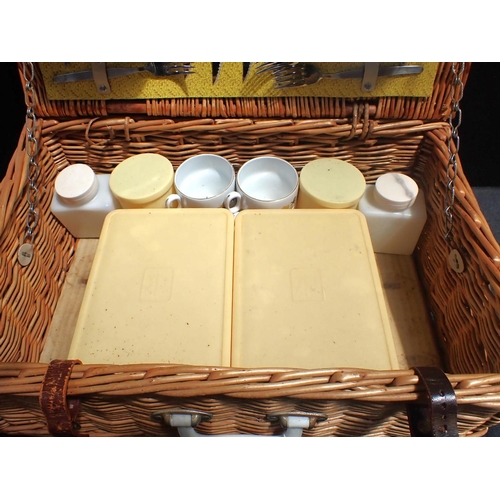 67 - A BREXTON PICNIC HAMPER with some contents (no flasks, hinge a/f)