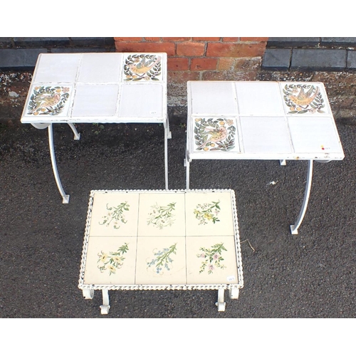 8 - A PAIR OF IRON CURVED 'X' FRAME GARDEN TABLES with tiled tops 54cm high, 42 x 37cm, and another simi... 