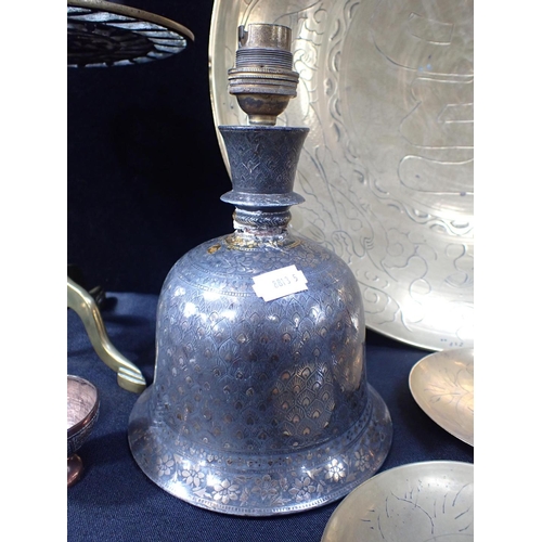 87 - A NEAR PAIR OF PERSIAN METAL CANDLESTICKS of bell form, converted to lamps (a/f), other Eastern meta... 