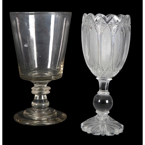 101 - A CLEAR GLASS OVERSIZED GOBLET

early 19th century, with tapered bowl on double ring stem and circul... 