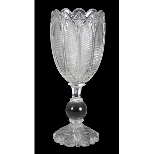 101 - A CLEAR GLASS OVERSIZED GOBLET

early 19th century, with tapered bowl on double ring stem and circul... 