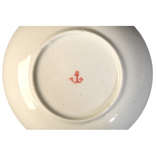 14 - A COZZI PORCELAIN TEABOWL AND SAUCER

18th century, Venetian, marked with a red anchor to the base, ... 