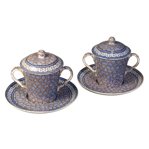 29 - A PAIR OF SPODE CHOCOLATE CUPS, COVERS AND STANDS

early 19th century, marked to the base, profusely... 