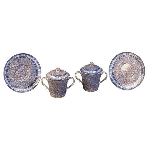 29 - A PAIR OF SPODE CHOCOLATE CUPS, COVERS AND STANDS

early 19th century, marked to the base, profusely... 