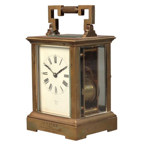 299 - A FRENCH BRASS CARRIAGE CLOCK BY VOKES

late 19th century, the movement striking on a gong, the whit... 