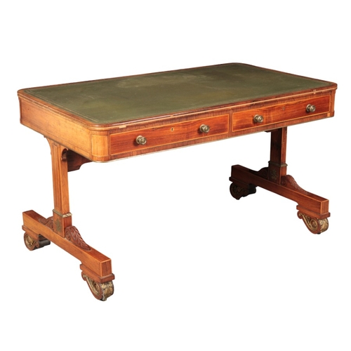 373 - A REGENCY ROSEWOOD AND BRASS INLAID WRITING TABLE IN THE MANNER OF GEORGE BULLOCK

the rectangular t... 