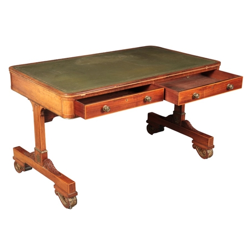 373 - A REGENCY ROSEWOOD AND BRASS INLAID WRITING TABLE IN THE MANNER OF GEORGE BULLOCK

the rectangular t... 