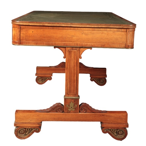 373 - A REGENCY ROSEWOOD AND BRASS INLAID WRITING TABLE IN THE MANNER OF GEORGE BULLOCK

the rectangular t... 