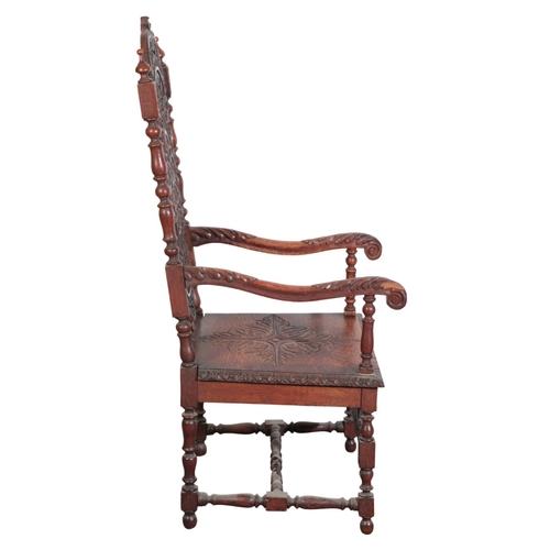 395 - AN OAK ARMCHAIR

in 17th century style, with foliate carved and pierced back over a square seat, on ... 