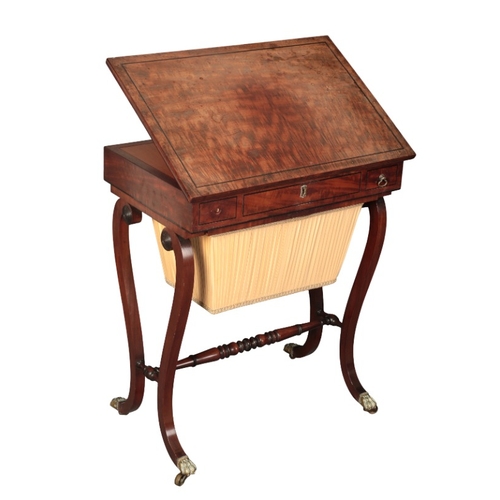 431 - A REGENCY WORK TABLE

the rectangular top inlaid with ebony stringing over an arrangement of three f... 