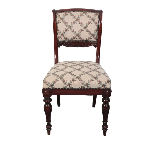 445 - A SET OF SIX EARLY VICTORIAN ROSEWOOD DINING CHAIRS

with scrolled cresting rails and carved splats,... 