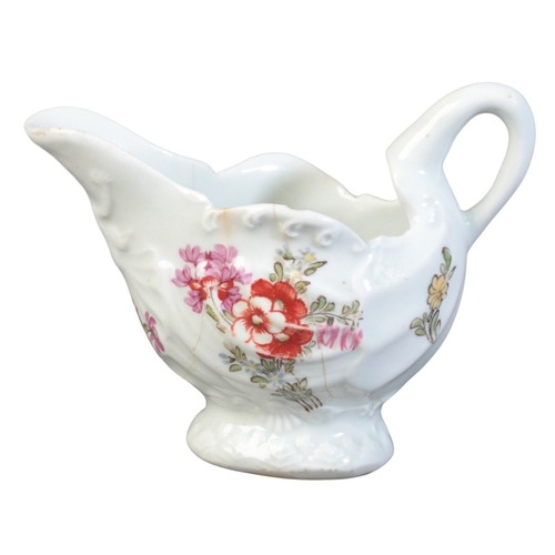 49 - A WORCESTER FIRST PERIOD PORCELAIN 'DOLPHIN EWER' CREAM JUG

circa 1770, decorated with floral spray... 