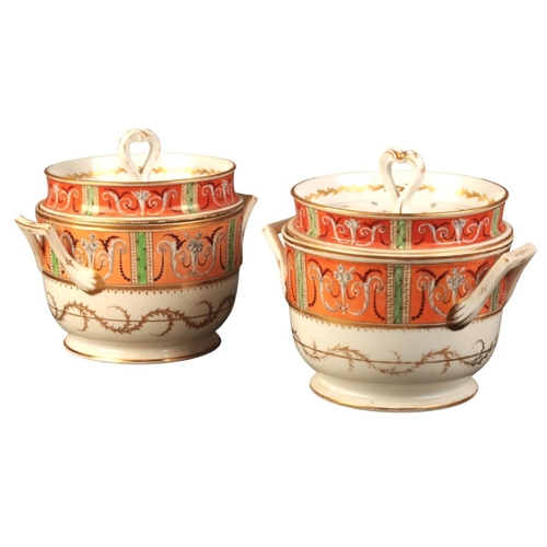 52 - A PAIR OF ENGLISH PORCELAIN ICE PAILS

circa 1810-1815, the covers with heart shape handles and deco... 