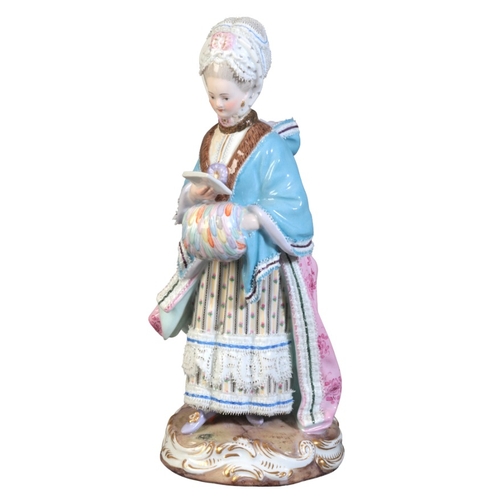 68 - A MEISSEN PORCELAIN FIGURE OF A COURTLY LADY

19th century, modelled standing, reading a letter and ... 