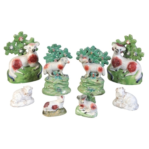 88 - A COLLECTION OF EIGHT STAFFORDSHIRE PEARLWARE SHEEP

19th century, including two pairs of a ram and ... 