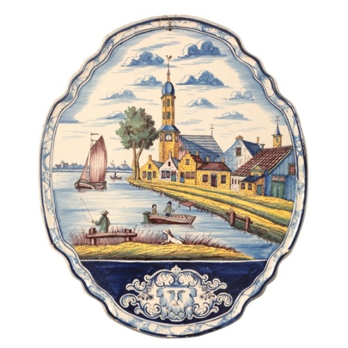 97 - A DUTCH DELFT WALL PLAQUE

dated '1758', decorated with ships to the foreground and a church to the ... 