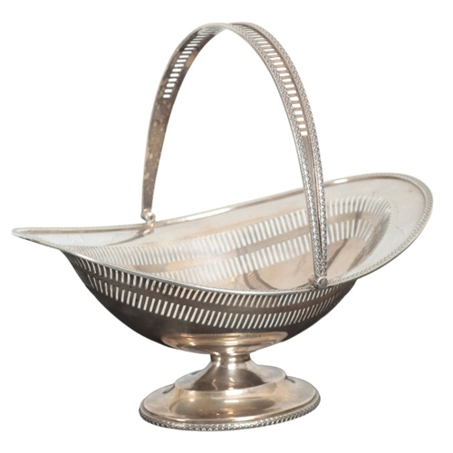 1 - A GEORGE V SILVER OVAL BASKET

by John Round & Son, Sheffield 1911, with bale handle, gadrooned and ... 