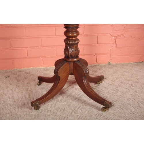 111 - A GEORGE IV MAHOGANY AND ROSEWOOD CROSSBANDED OCCASIONAL TABLE

the rectangular tilting top on a tur... 