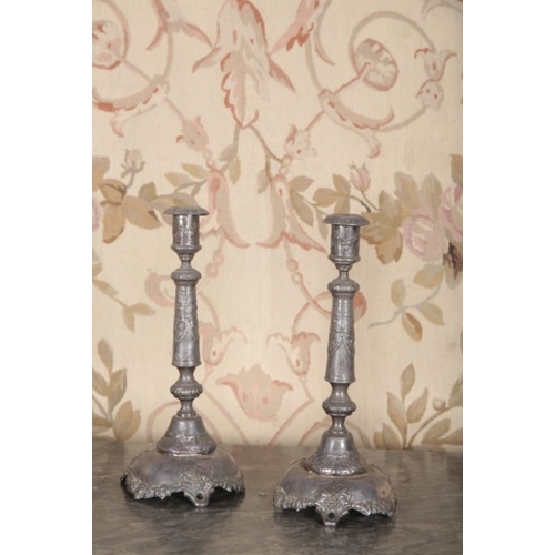 112 - A PAIR OF POLISH PEWTER CANDLESTICKS

circa 1900, stamped marks to the base, 35.5cm high (2)