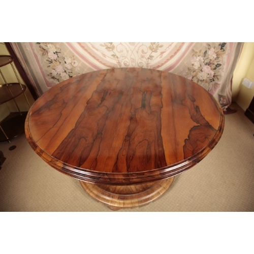 133 - A WILLIAM IV ROSEWOOD CENTRE TABLE

the circular tilt-top with a moulded outside edge, on a tapered ... 