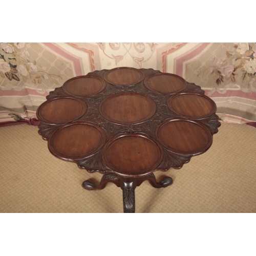 137 - A GEORGE III MAHOGANY SUPPER TABLE

circa 1770, the shaped tilt-top on a bird cage movement with she... 