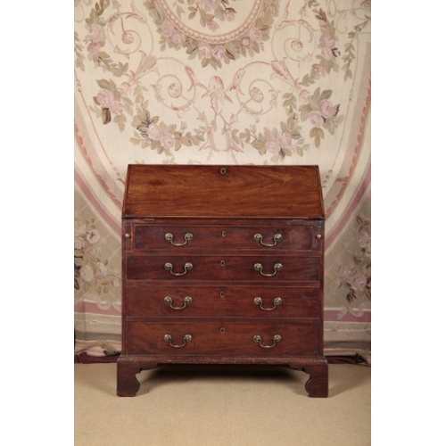 138 - A GEORGE III MAHOGANY BUREAU

the fall front opening to a fitted interior with pigeonholes and small... 