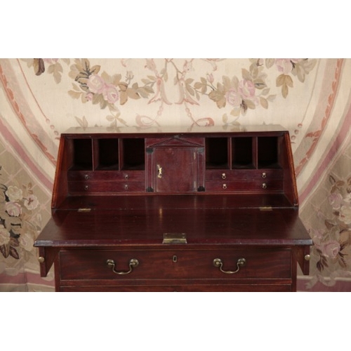 138 - A GEORGE III MAHOGANY BUREAU

the fall front opening to a fitted interior with pigeonholes and small... 