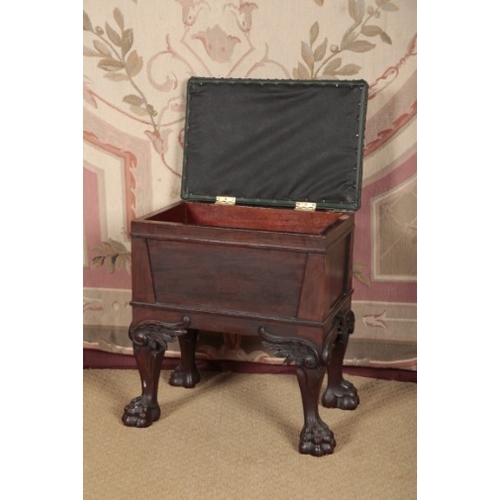 144 - AN EDWARDIAN MAHOGANY PIANO STOOL

the leather covered hinged lid opening to a vacant interior, on h... 