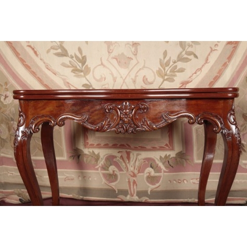 149 - A LOUIS XVI STYLE MAHOGANY CARD TABLE

19th century, the serpentine hinged top opening to a baize li... 