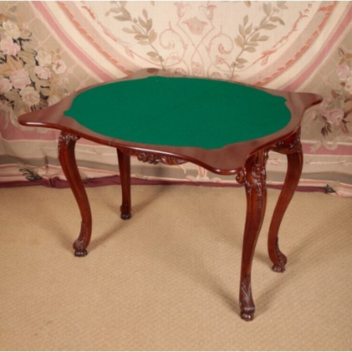 149 - A LOUIS XVI STYLE MAHOGANY CARD TABLE

19th century, the serpentine hinged top opening to a baize li... 