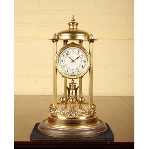 162 - A GILT BRASS ANNIVERSARY CLOCK BY KIENINGER AND OBERGFELL

with four-hundred day movement, the ename... 