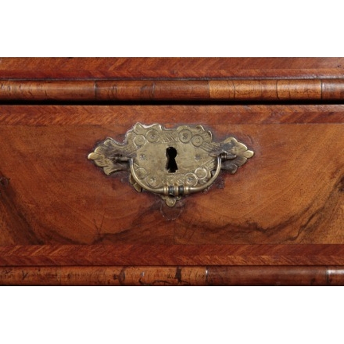 168 - A QUEEN ANNE WALNUT BUREAU

early 18th century and later, the herringbone crossbanded fall front ope... 