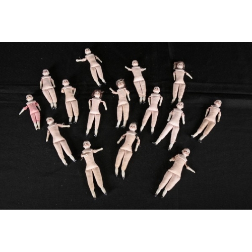 202 - A QUANTITY OF MINIATURE DOLLS

with bisque heads, 14cm high (a lot)