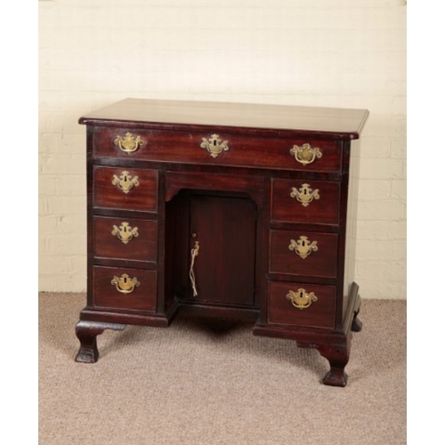 209 - A GEORGE II MAHOGANY KNEEHOLE DESK

circa 1750, the one long and six short drawers around a central ... 