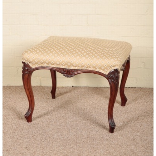 214 - A VICTORIAN ROSEWOOD STOOL

stamped 'C. Munro', the covered square seat on slender carved cabriole l... 