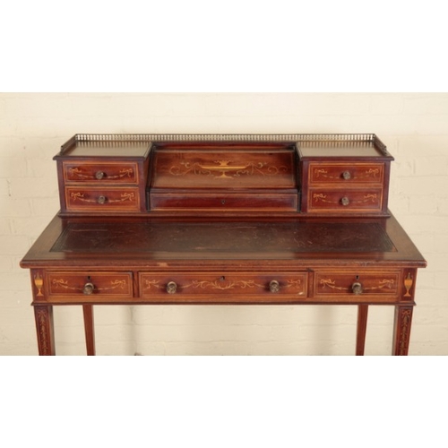 218 - A MAHOGANY AND MARQUETRY DESK BY EDWARDS AND ROBERTS

stamped to the drawer lining, the raised super... 