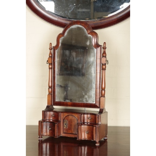 226 - A QUEEN ANNE STYLE WALNUT DRESSING MIRROR

18th century and later, the shaped plate on turned suppor... 