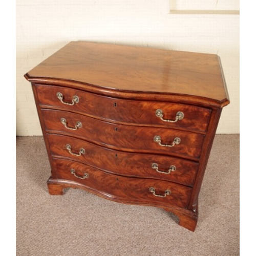 227 - A GEORGE III MAHOGANY SERPENTINE CHEST OF DRAWERS

the top with a moulded edge over four graduated d... 