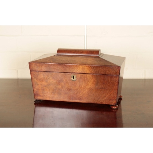 232 - A VICTORIAN ROSEWOOD SARCOPHAGUS TEA CADDY

the hinged lid opening to an interior fitted with two li... 