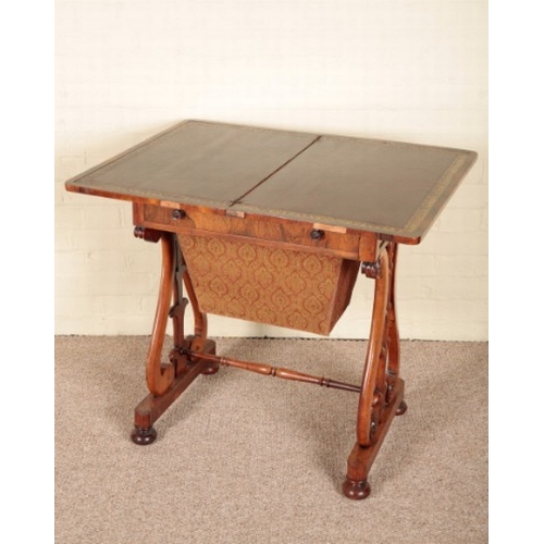 235 - A VICTORIAN ROSEWOOD WORK TABLE

the hinged lid opening to a gilt tooled leather writing surface, a ... 