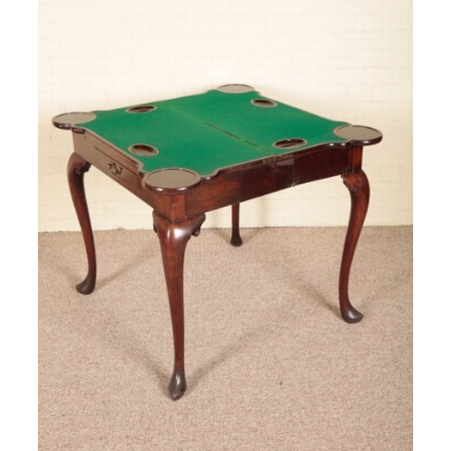 240 - A GEORGE II MAHOGANY CARD TABLE

with a concertina action, the hinged lid opening to a baize-lined i... 