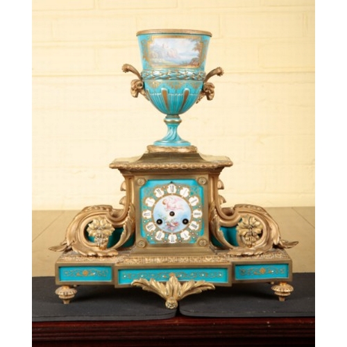 247 - A FRENCH GILT METAL AND PORCELAIN MOUNTED MANTEL CLOCK

19th century, the two train movement strikin... 