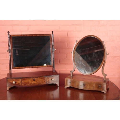 250 - A REGENCY MAHOGANY DRESSING MIRROR

the rectangular plate on ring-turned supports, the bow front bas... 