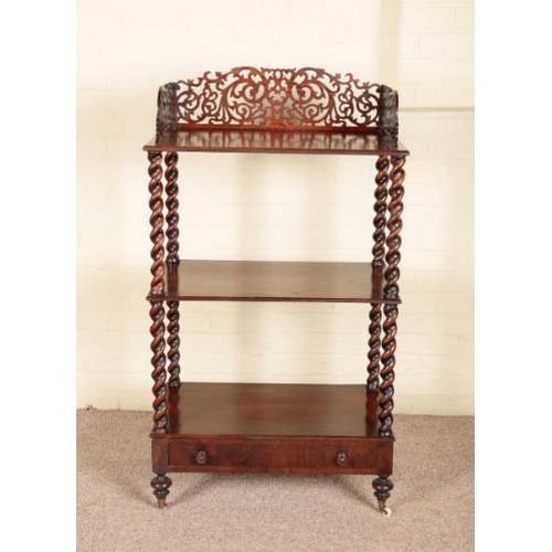 251 - A VICTORIAN ROSEWOOD WHATNOT

the three-quarter pierced fretwork gallery over three tiers on barley ... 