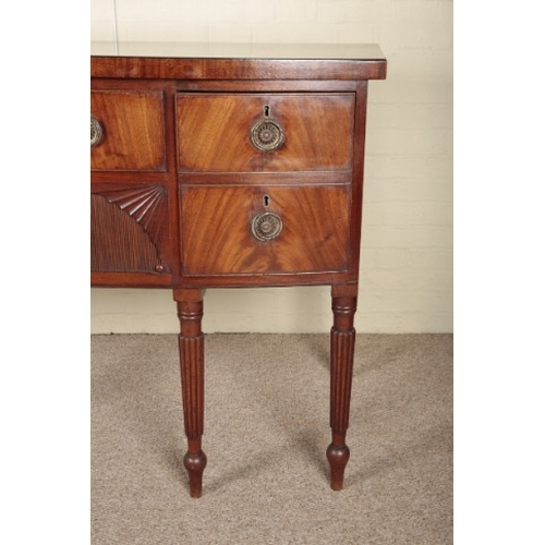 258 - A REGENCY BOWFRONT SIDEBOARD

with an arrangement of short drawers, tambour fronted cupboard and lea... 